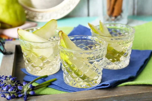 Pear juice with fresh fruits on table close up — Stock Photo, Image