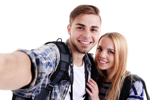 Para podróżnych przy selfie na białym tle — Zdjęcie stockowe