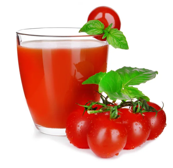 Glass of tomato juice with green leaves isolated on white — Stock Photo, Image