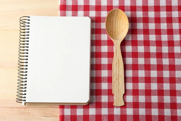 Open recipe book on wooden background — Stock Photo, Image