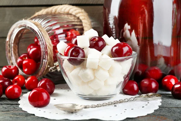 Ingredients for cherry compote on table, on light background — Stock Photo, Image