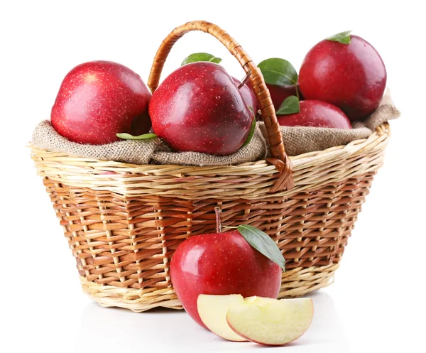 Red apples in wicker basket isolate on white — Stock Photo, Image