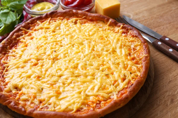 Tasty cheese pizza on table close up — Stock Photo, Image