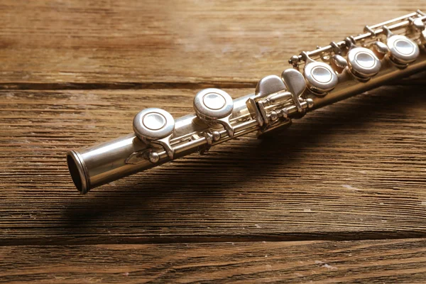 Flute on wooden background — Stock Photo, Image