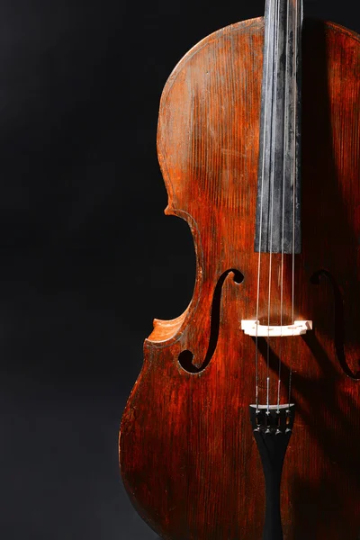 Vintage cello on dark background — Stock Photo, Image