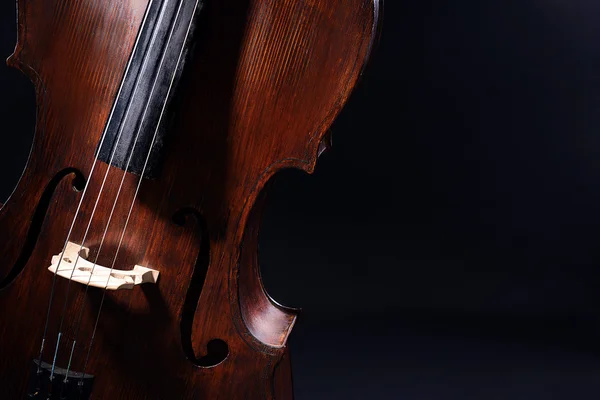 Vintage wiolonczela na ciemnym tle — Zdjęcie stockowe