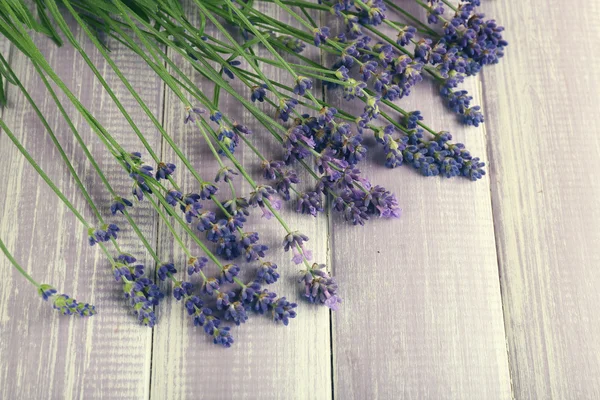 Lavender flowers on table — Stock Photo, Image