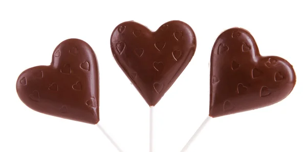 在心灵上白色孤立形状的巧克力糖果 — 图库照片