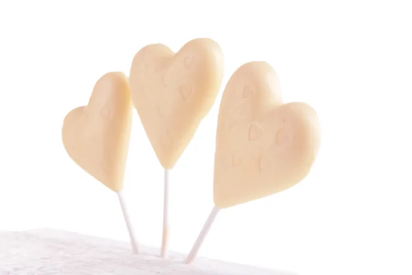 Caramelle saporite a forma di cuore isolato su bianco — Foto Stock