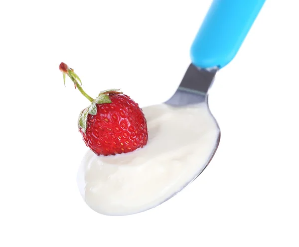 Delicious yogurt in spoon with strawberry isolated on white — Stock Photo, Image