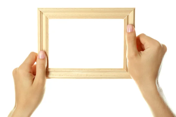 Female hands with wooden frame — Stock Photo, Image