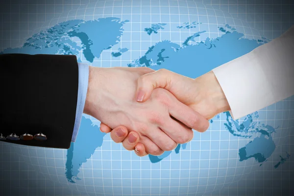 Business handshake on world map background — Stock Photo, Image