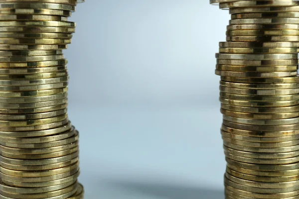 Pile of coins on light background — Stock Photo, Image