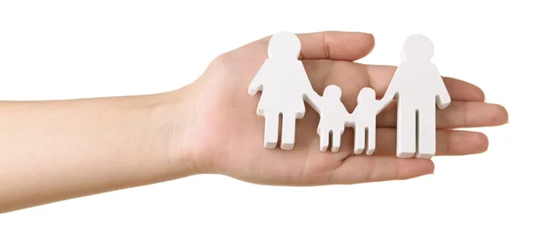 Female hand with model of family isolated on white — Stock Photo, Image