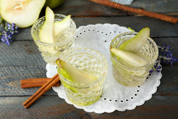 Pear juice with fresh fruits on table close up — Stock Photo, Image