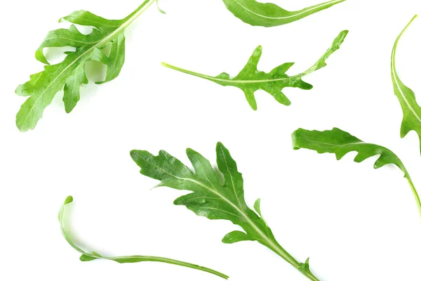 Groene rucola bladeren geïsoleerd op wit — Stockfoto