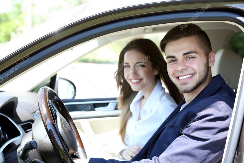 Young couple in cabriolet