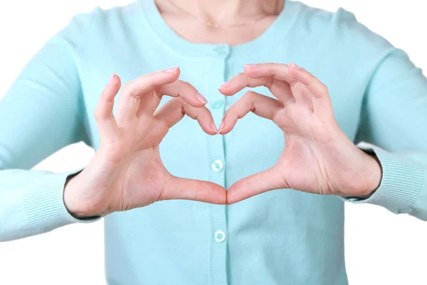 Fille avec ses mains en forme de coeur — Photo