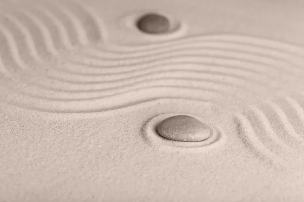 Zen garden with stones on sand background — Stock Photo, Image