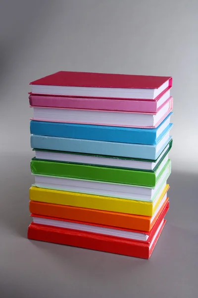 Colorful books on gray background — Stock Photo, Image