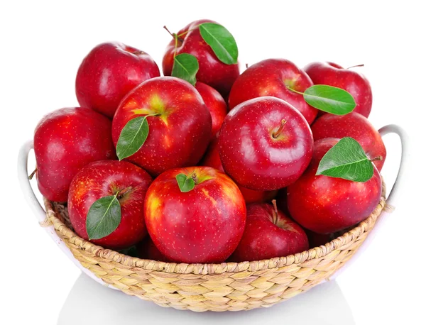 Ripe red apple in wicker basket isolated on white — Stock Photo, Image