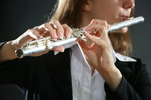 Musician playing flute, closeup — Stock Photo, Image