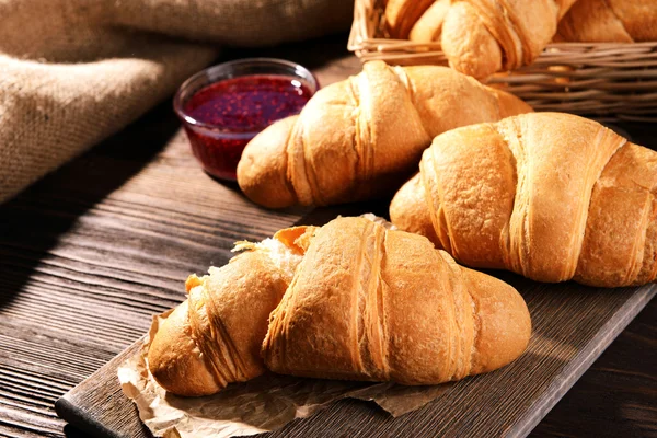 Delicious croissants on table close-up — Stock Photo, Image