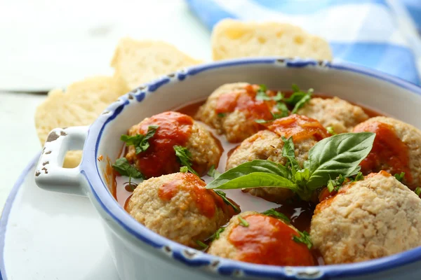 Meat balls with tomato sauce, on wooden background — Stock Photo, Image