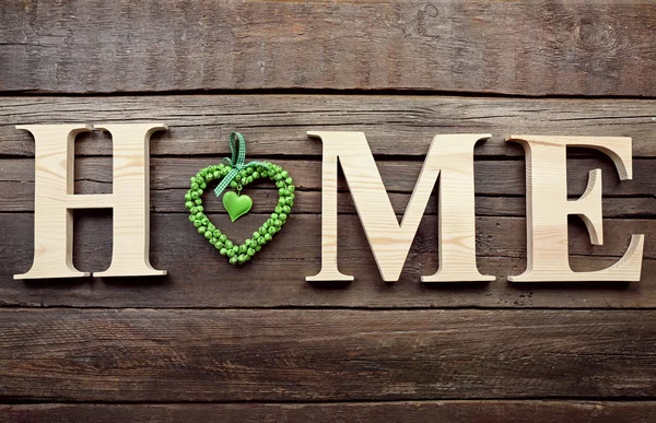 Letras decorativas formando palavra HOME — Fotografia de Stock