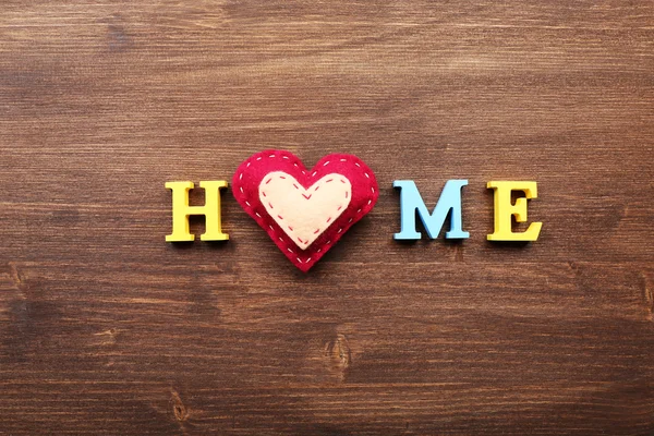 Litery dekoracyjne tworzące słowo HOME — Zdjęcie stockowe