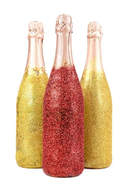 Garrafas brilhantes de champanhe isoladas em branco — Fotografia de Stock