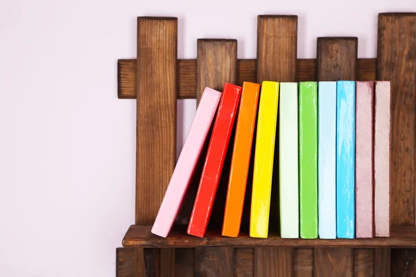 Wooden shelf with books — Stock Photo, Image