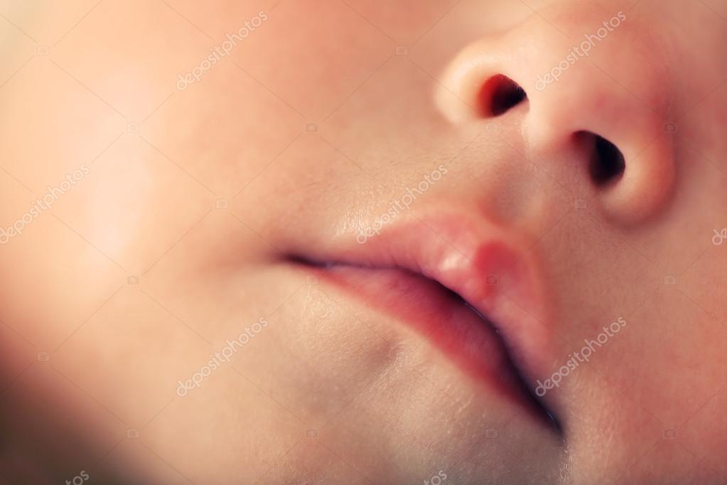 Baby lips and nose — Stock Photo © belchonock 78344832