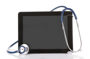 Stetoskop ve üzerinde beyaz izole tablet