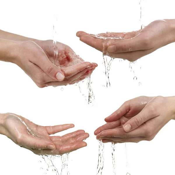 Mãos humanas com salpicos de água — Fotografia de Stock