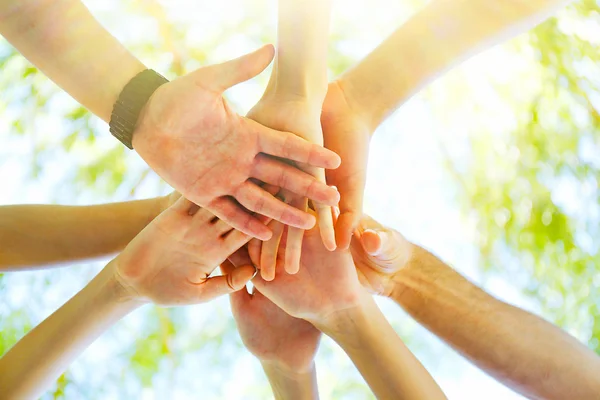 Hands of young people close up — Stock Photo, Image