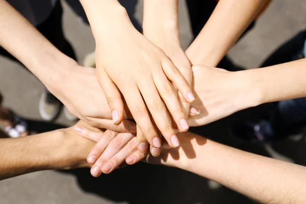 United hands outdoors — Stock Photo, Image