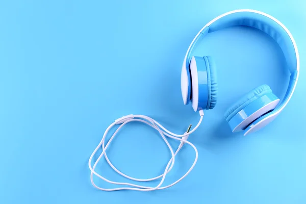 Headphones on blue background — Stock Photo, Image