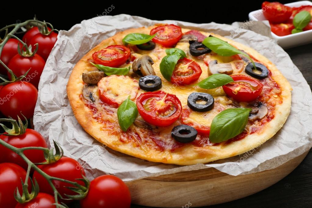 https://st2.depositphotos.com/1177973/7887/i/950/depositphotos_78874976-stock-photo-tasty-pizza-with-vegetables.jpg