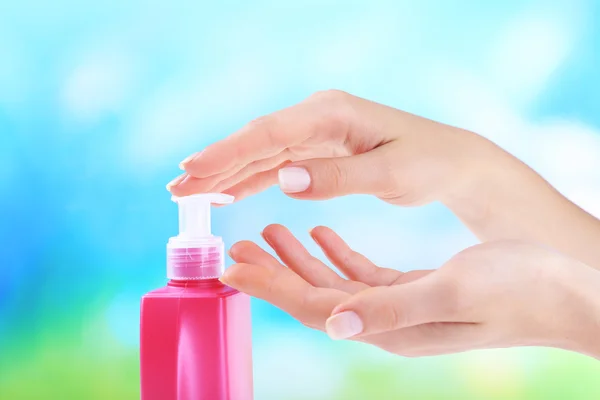 Female hands with cream — Stock Photo, Image