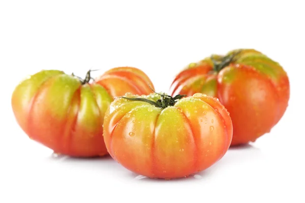 Green tomatoes with water drops isolated on white — Stock Photo, Image