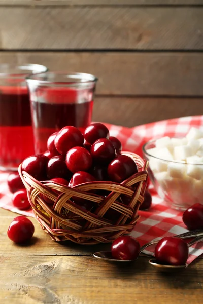 Ingredients for cherry compote on table, on light background — Stock Photo, Image