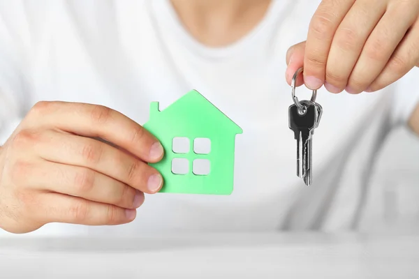 Male hands and house — Stock Photo, Image