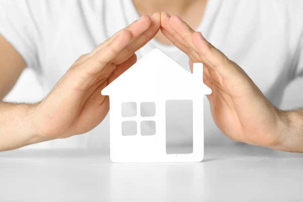 Male hands and house — Stock Photo, Image