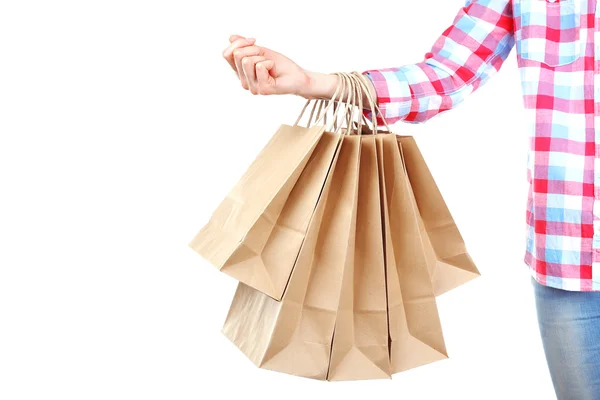 Female hand holding paper shopping bag isolated on white — Stock Photo, Image