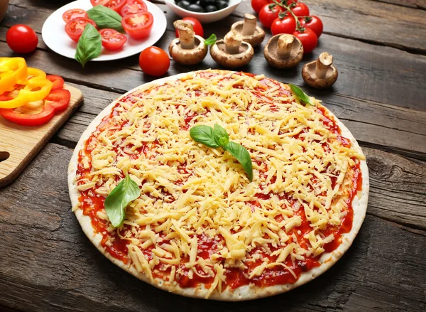 Voedingsmiddelen en nieuwe voedselingrediënten voor pizza — Stockfoto