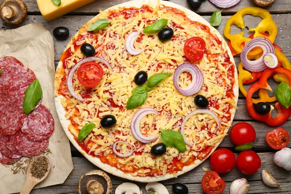 Food ingredients for pizza on table — Stock Photo, Image