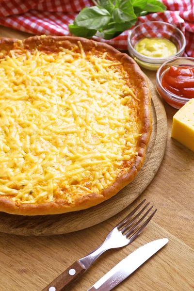 Tasty cheese pizza on table — Stock Photo, Image