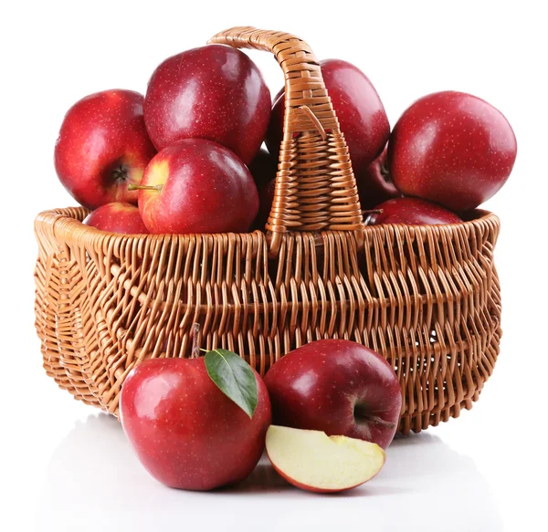 Red apples in wicker basket — Stock Photo, Image