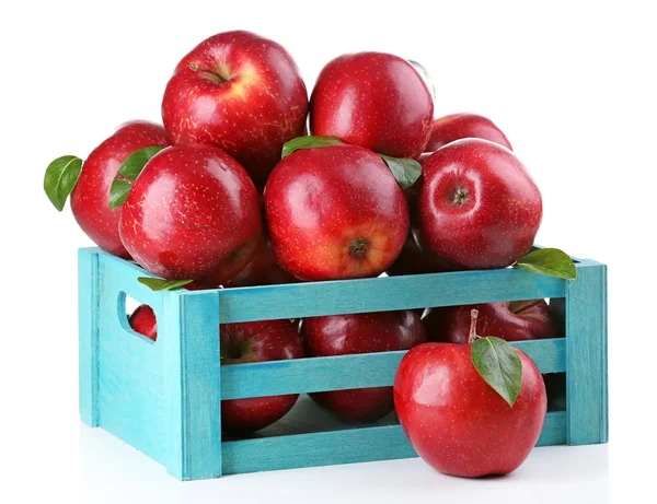 Червоні яблука в дерев'яній ящиці — стокове фото